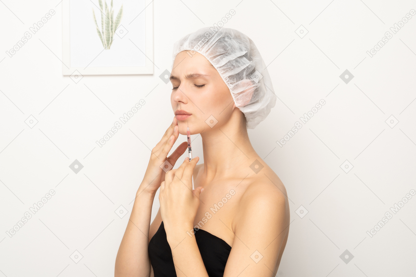 Young woman with closed eyes holding syringe and touching her face