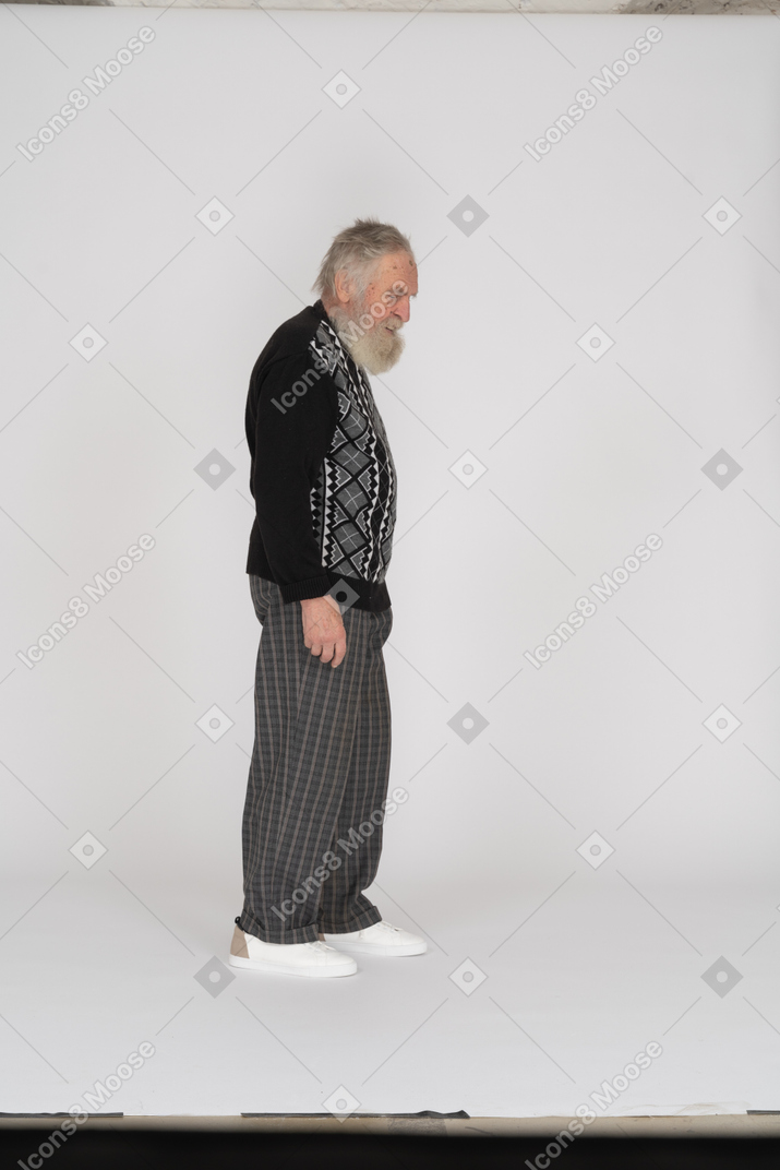 Side view of an old man standing