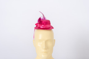 Pink hat on a mannequin head