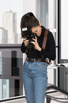 A woman taking a picture with a camera