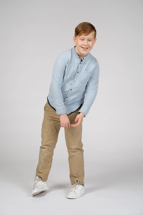 Front view of a boy looking at something with interest