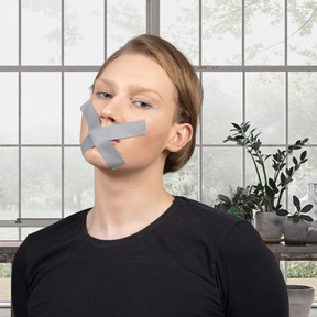 A woman with duct taped mouth