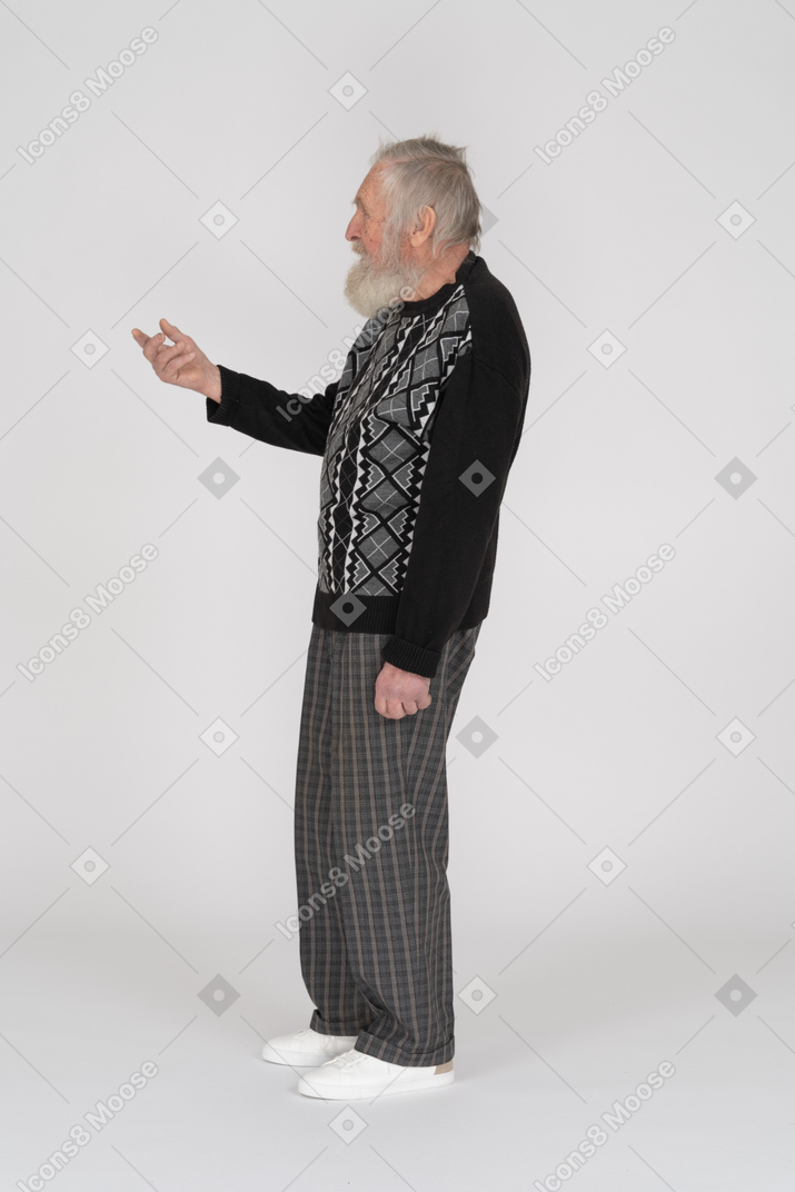 Vue latérale d'un homme âgé faisant des gestes et demandant quelque chose