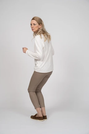 Woman in casual clothes standing