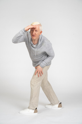 Man standing and looking into distance