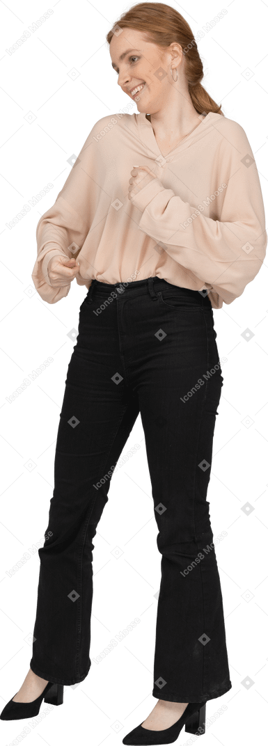 Woman in beautiful blouse standing