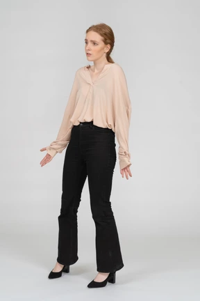 Woman in beautiful blouse standing