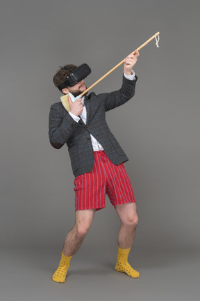 A young man enjoying vr glasses