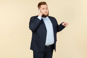 Young overweight man office worker involved in conversation