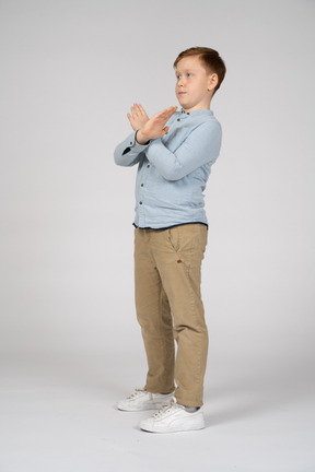 Boy making stop gesture