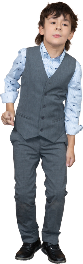 Front view of a boy in suit dancing