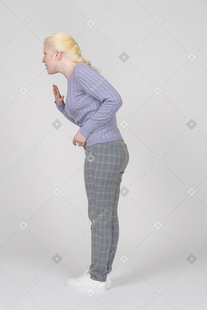 Young woman bending down