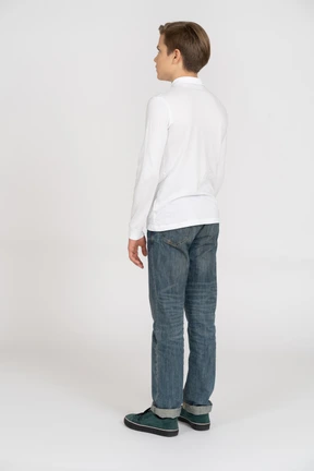Young man in casual clothes standing