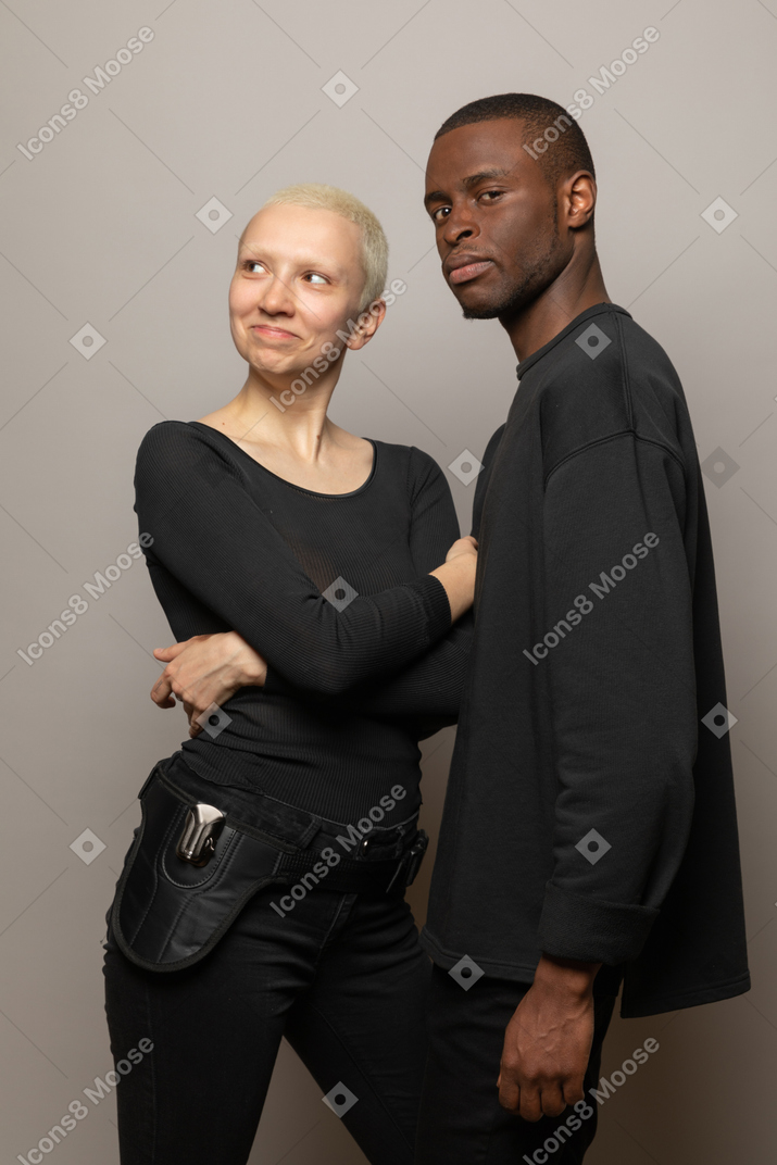 Smiling woman standing with a man