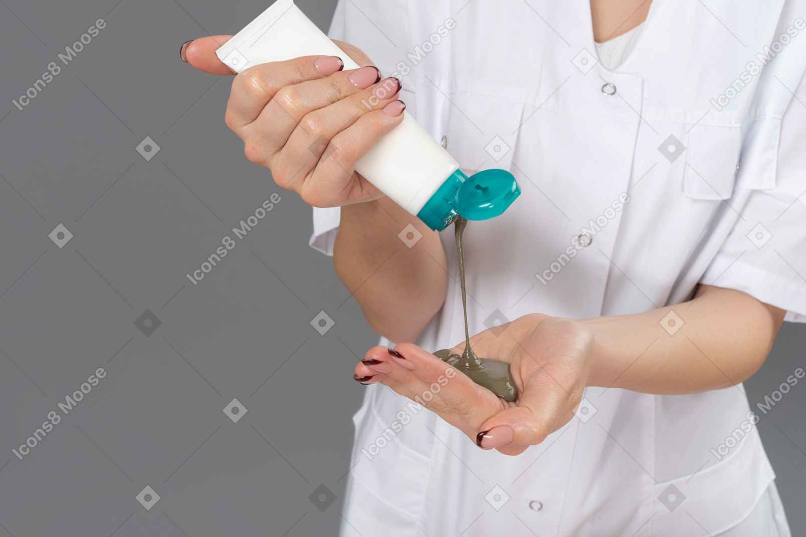 Squeezing a lotion on hand