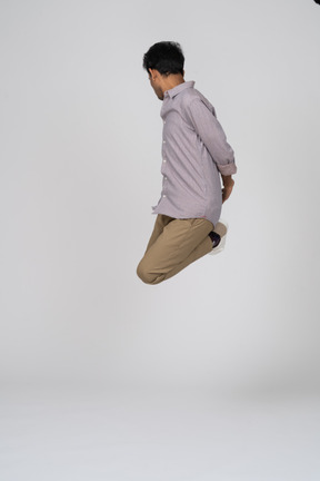 Man in casual clothes jumping