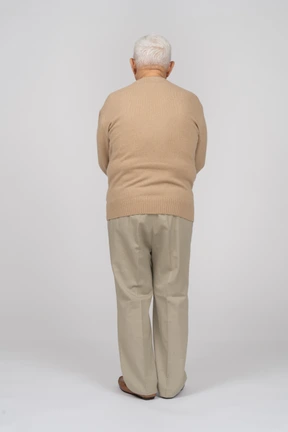 Rear view of an old man in casual clothes