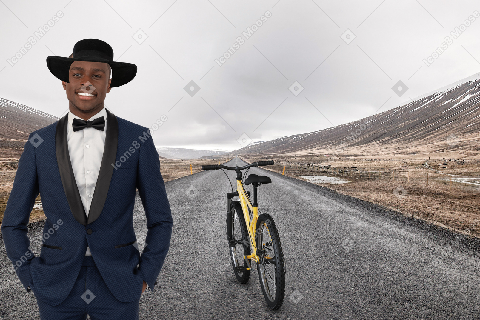 A man in a suit and hat standing next to a bike