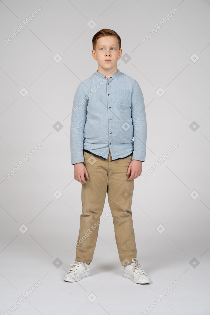 Front view of a cute boy in casual clothes