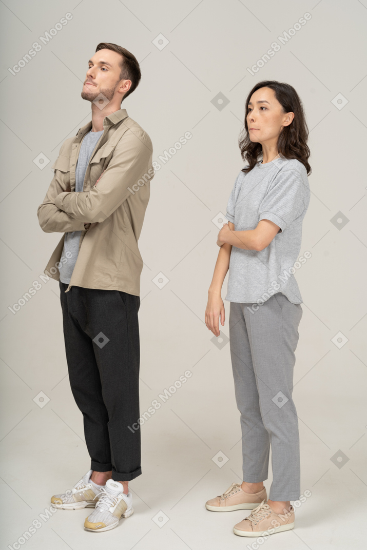 Three-quarter view of young couple standing