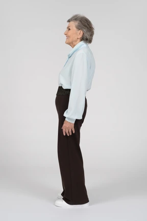 Side view of an old woman smiling widely