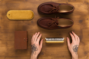 Male leather shoes on wooden background