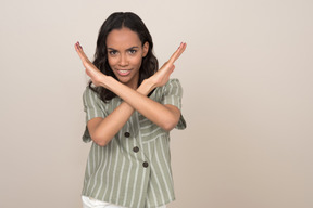 Woman making enough gesture