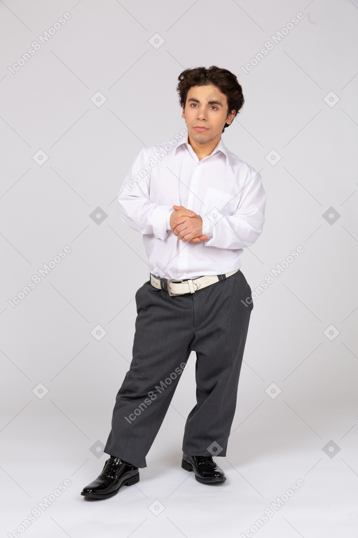 Young man with folded hands
