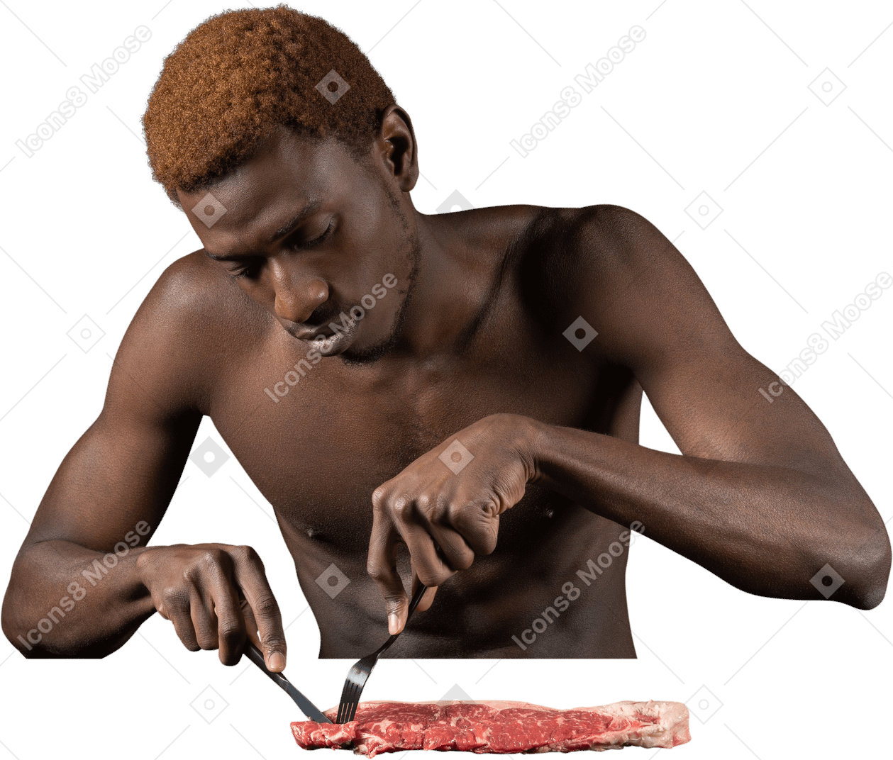 Front view of a young afro man cutting meat