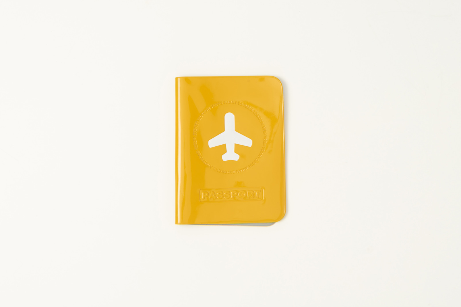 Yellow passport cover on a white background