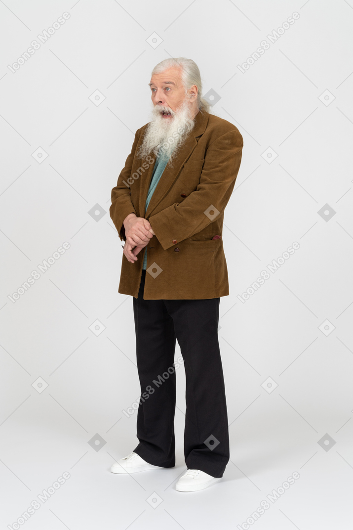 Elderly man looking utterly shocked with mouth agape