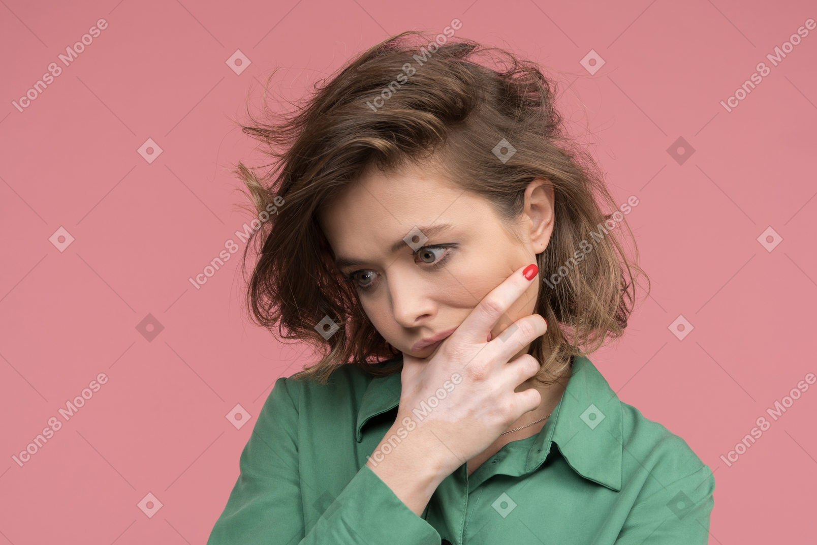 Concerned brunette woman standing deep in thoughts