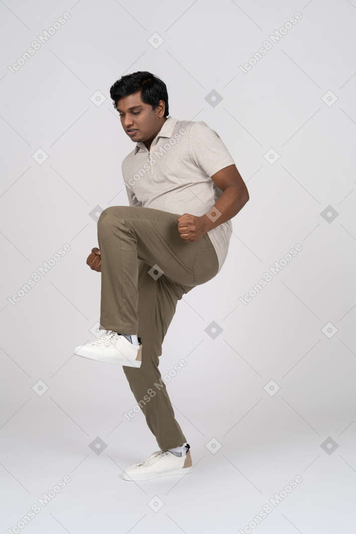 Man in casual clothes posing