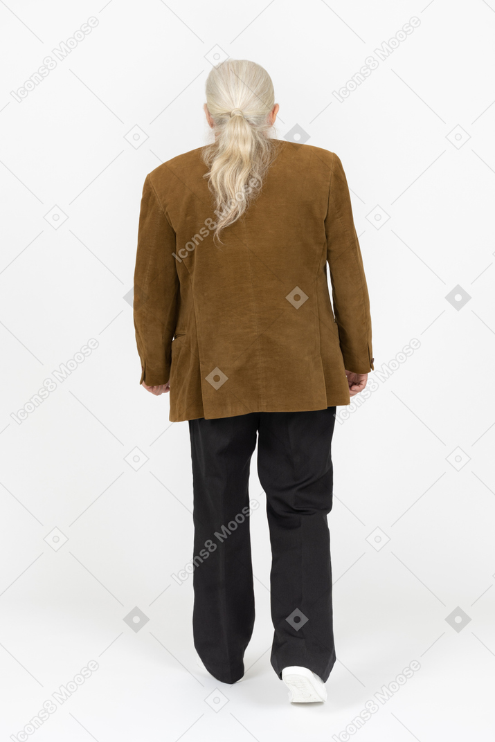 Back view of an old man walking