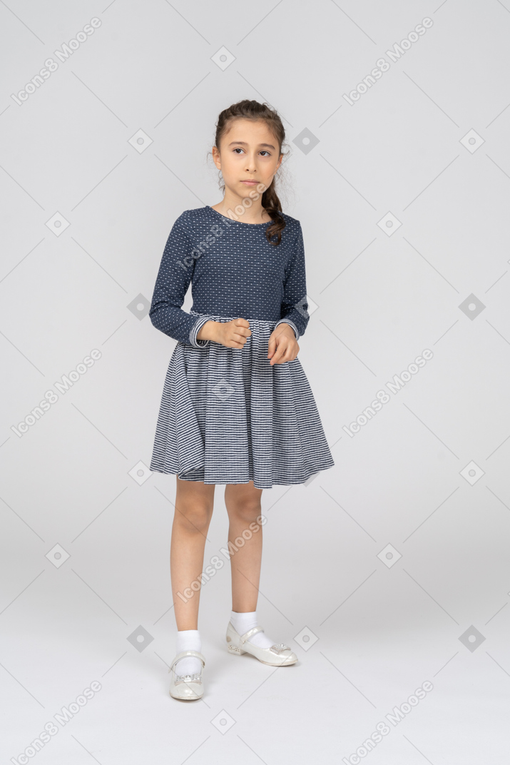 Three-quarter view of a girl looking cautious