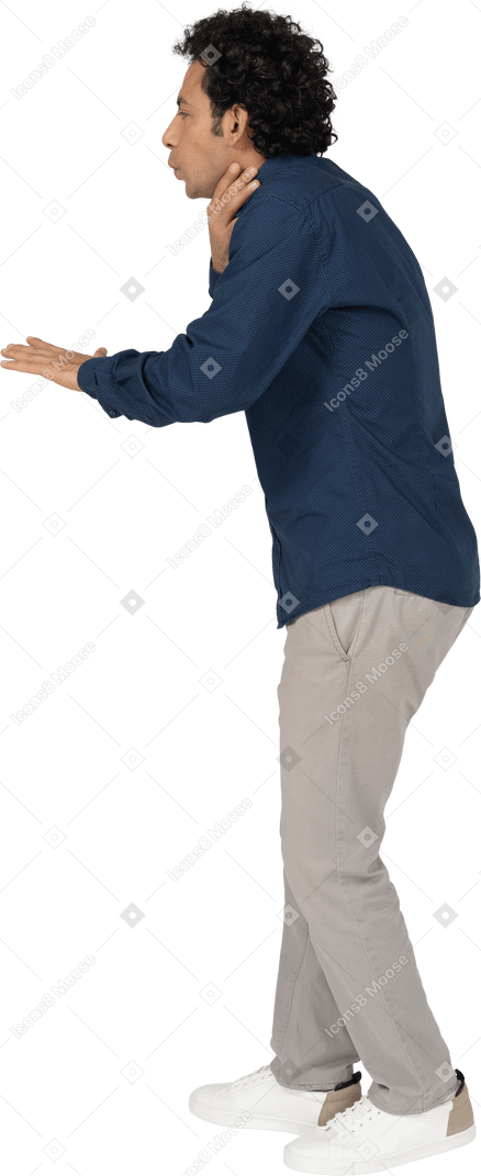 Side view of a man in casual clothes choking himself