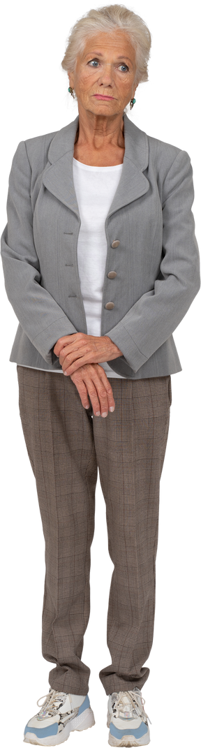 Front view of a sad old lady in suit