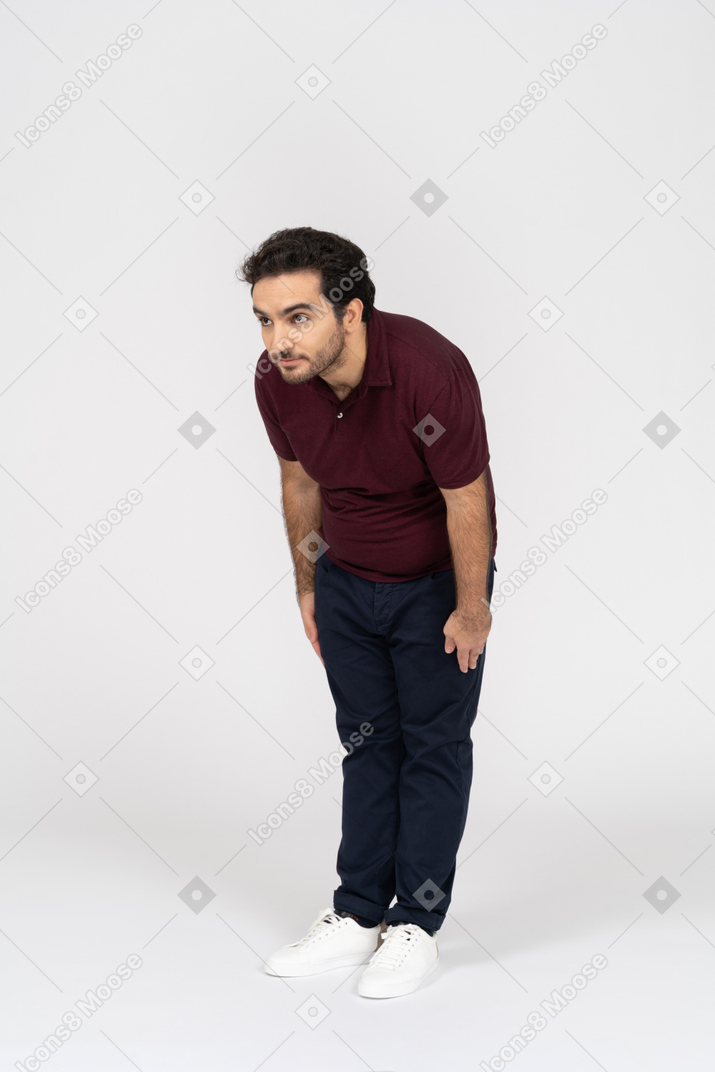 Man in casual clothes bowing