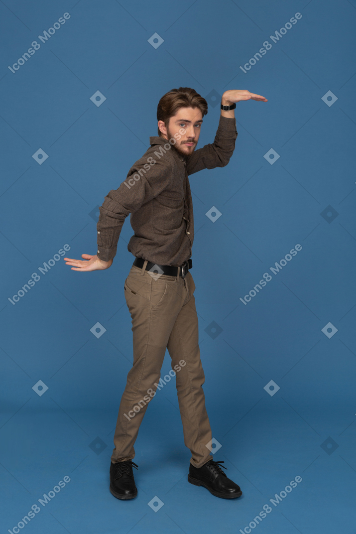Slim young man showing egyptian poses