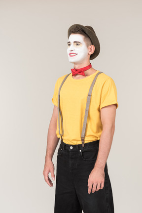 Male clown standing half sideways