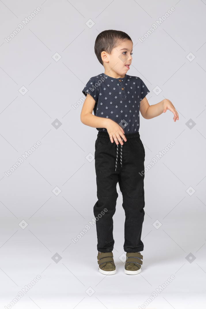 Front view of a cute boy dancing