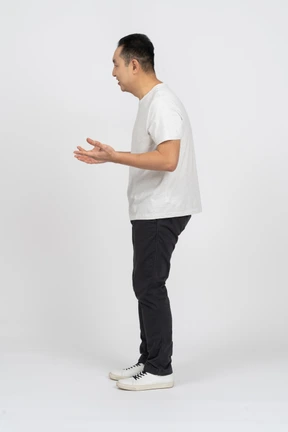 Side view of a man explaining something