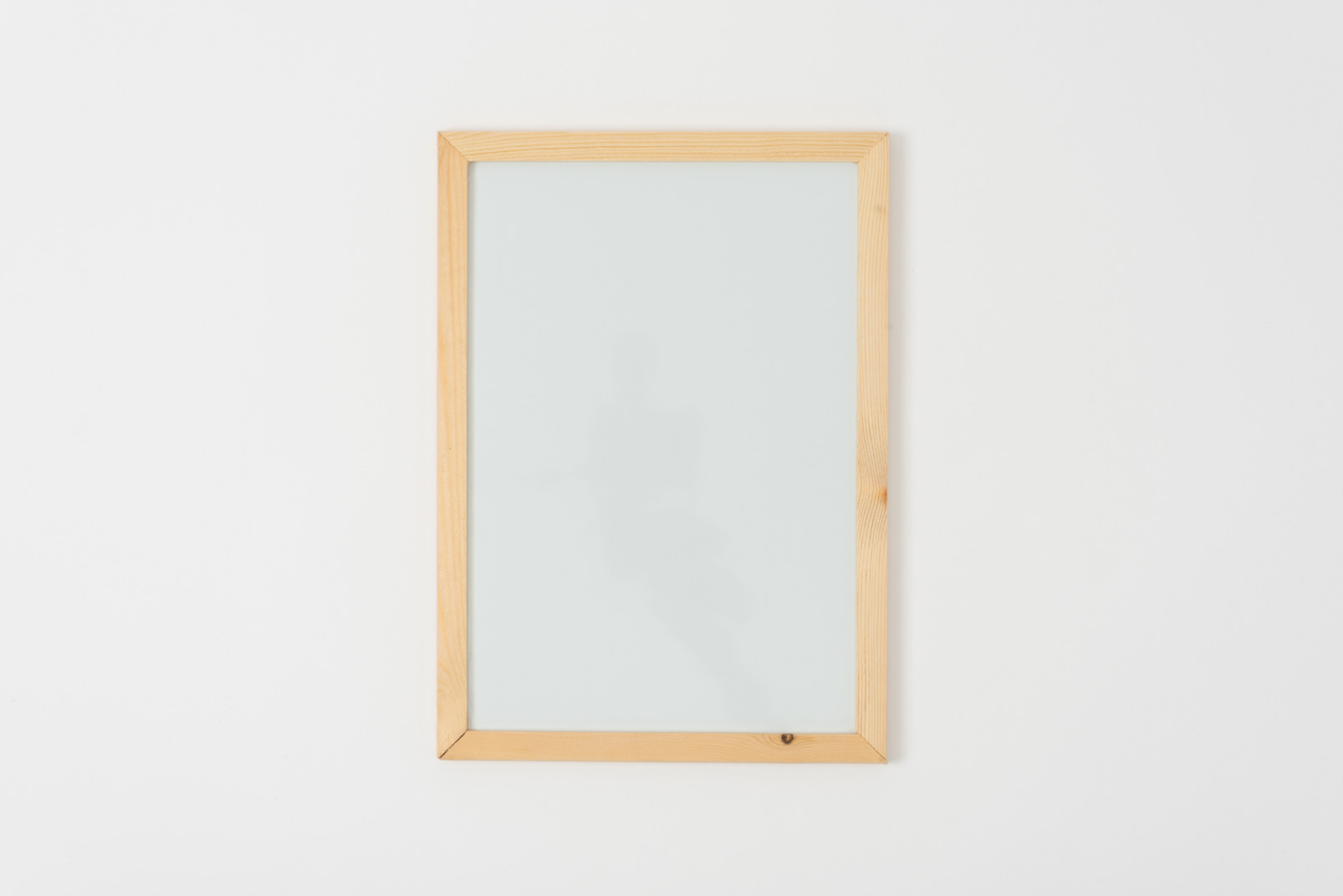Wooden frame with a sheet of paper