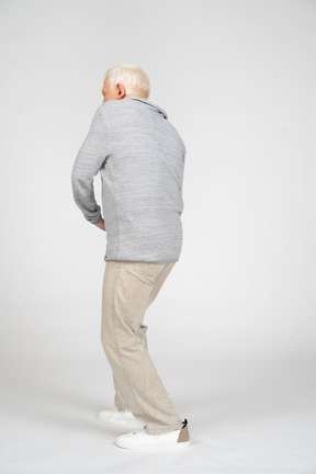 Rear view of man gesturing