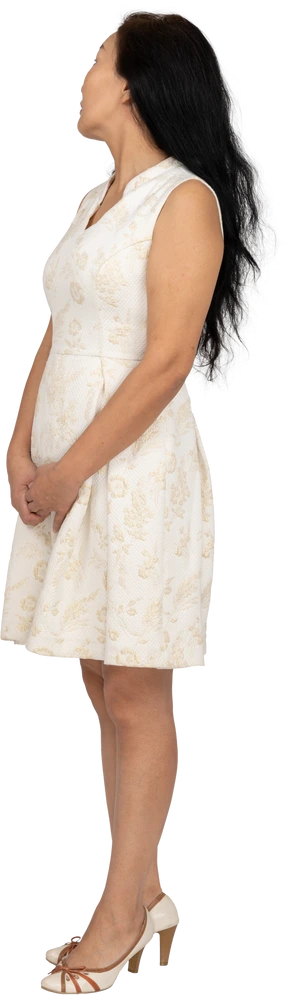 Woman in beautiful dress standing