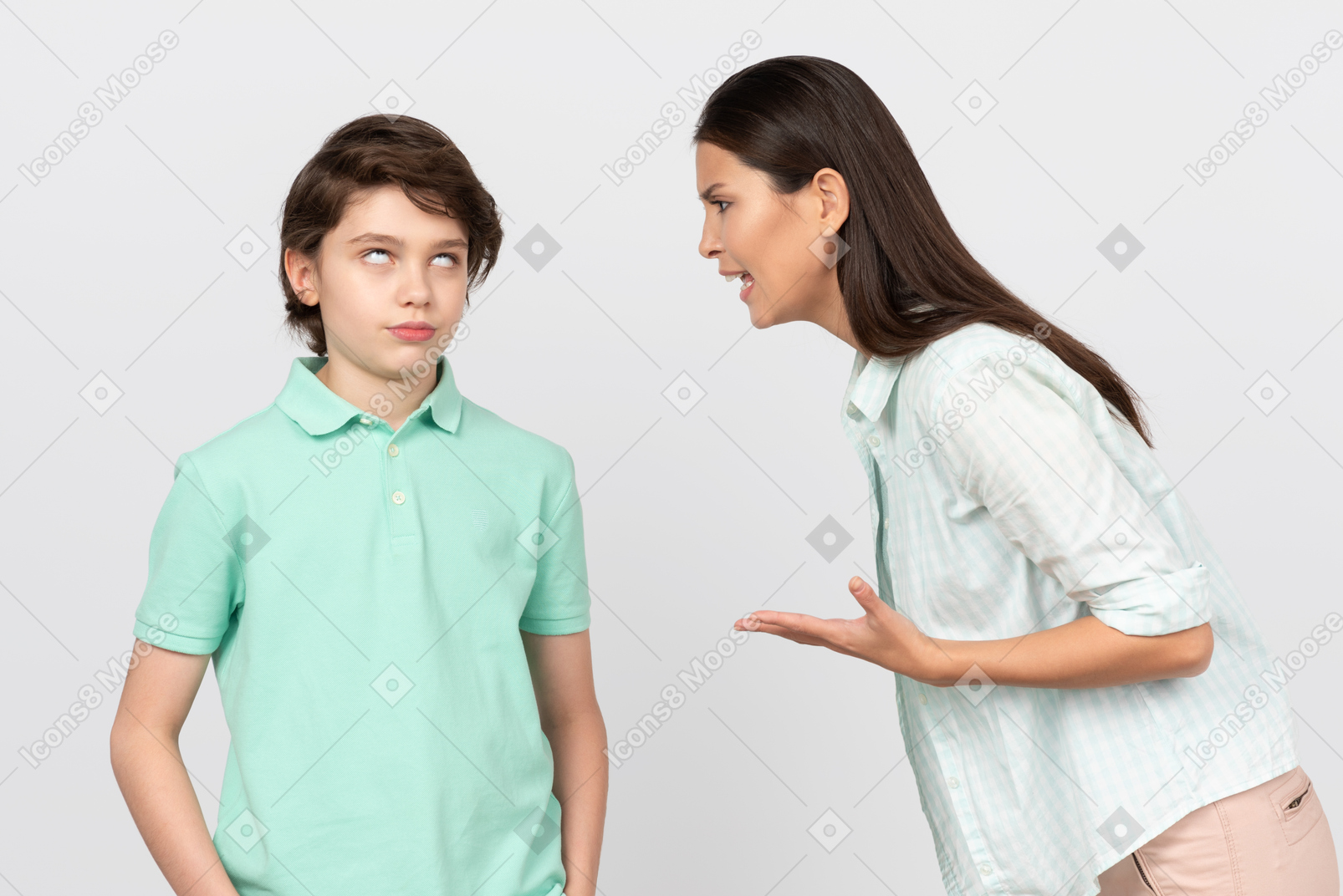Angry mother telling her son off