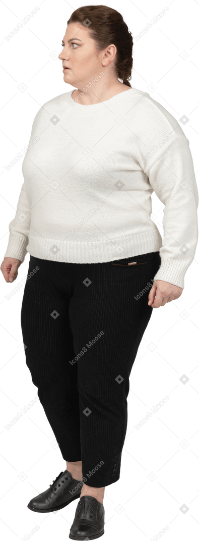 Surprised woman in casual clothes standing