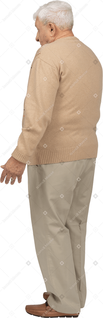 Side view of a confused old man in casual clothes