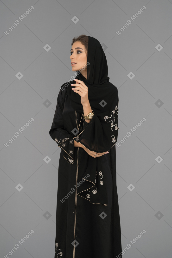 Young muslim woman looking sideways