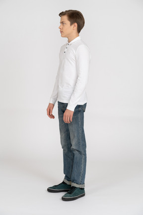 Young man in casual clothes standing